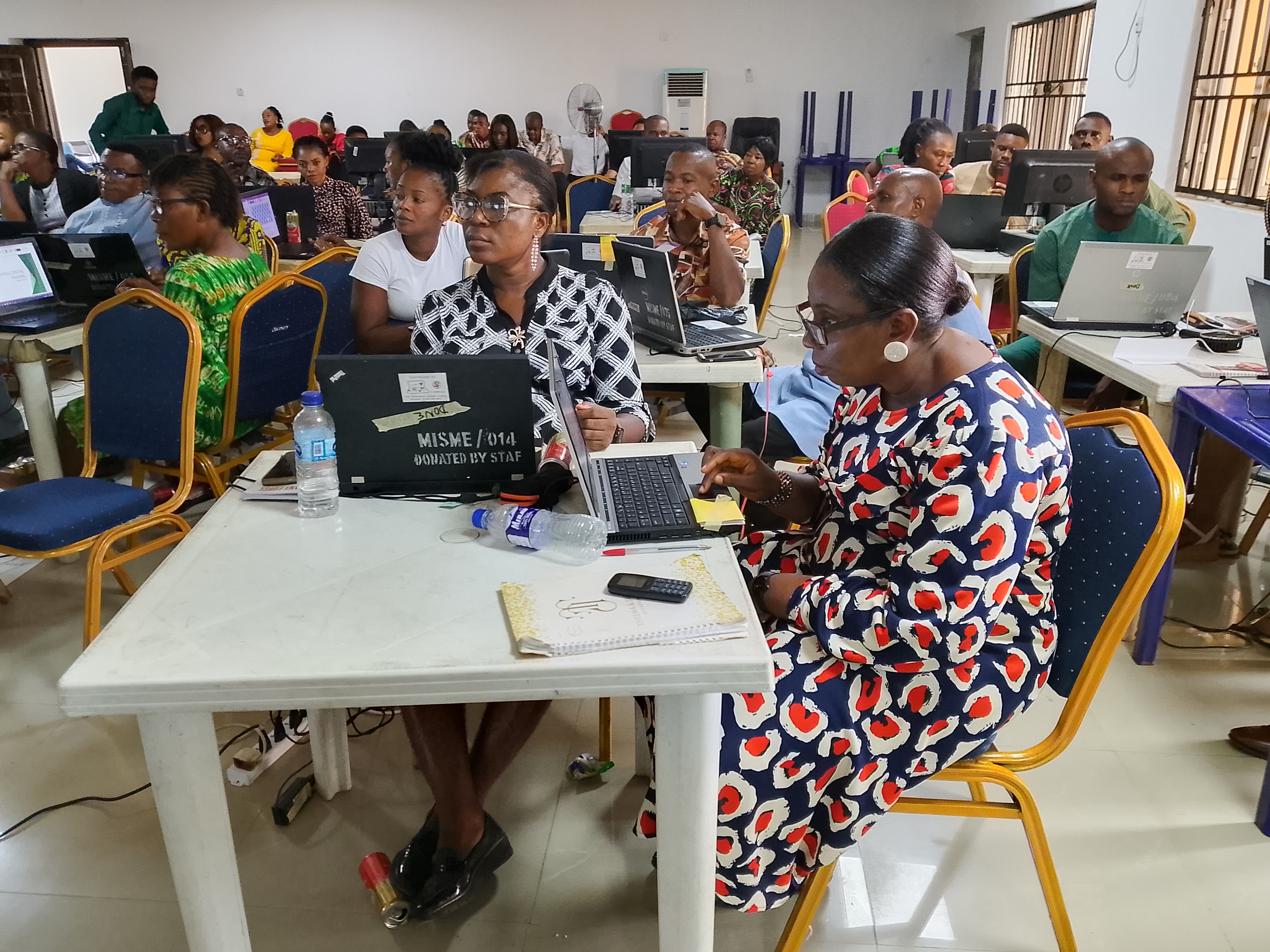 Adult professionals and civil servants participating in digital capacity training